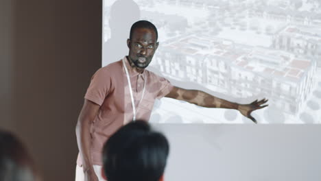 African-American-Man-Giving-Presentation-on-Architecture-Conference